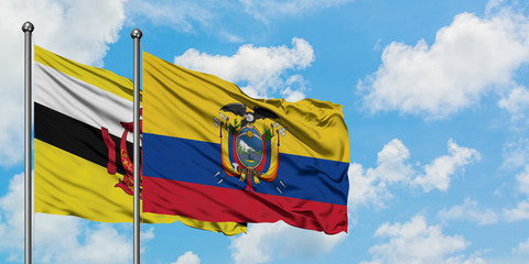 Brunei and Ecuador flag waving in the wind against white cloudy blue sky together. Diplomacy concept, international relations.