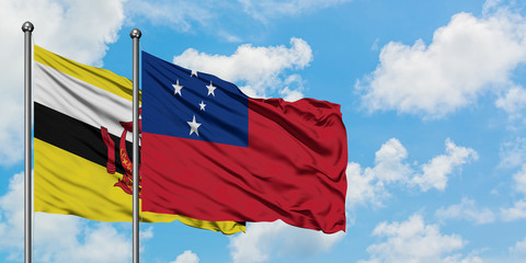 Brunei and Samoa flag waving in the wind against white cloudy blue sky together. Diplomacy concept, international relations.