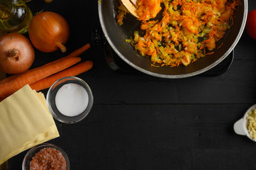 Cooking Italian Lasagna, background for design. Cooking process top view.