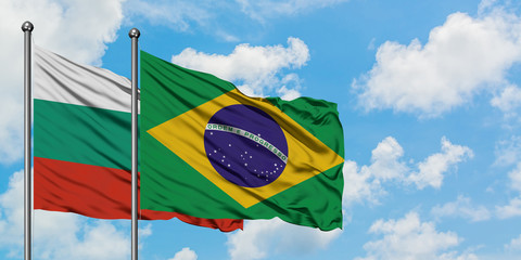 Bulgaria and Brazil flag waving in the wind against white cloudy blue sky together. Diplomacy concept, international relations.
