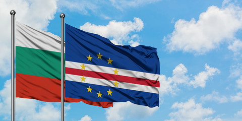 Bulgaria and Cape Verde flag waving in the wind against white cloudy blue sky together. Diplomacy concept, international relations.