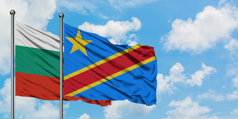 Bulgaria and Congo flag waving in the wind against white cloudy blue sky together. Diplomacy concept, international relations.