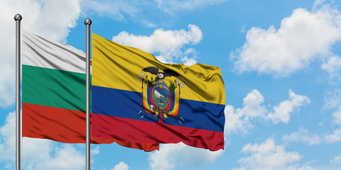 Bulgaria and Ecuador flag waving in the wind against white cloudy blue sky together. Diplomacy concept, international relations.