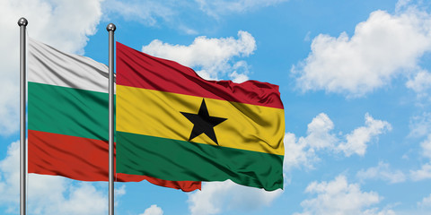 Bulgaria and Ghana flag waving in the wind against white cloudy blue sky together. Diplomacy concept, international relations.