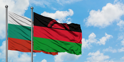 Bulgaria and Malawi flag waving in the wind against white cloudy blue sky together. Diplomacy concept, international relations.