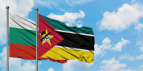 Bulgaria and Mozambique flag waving in the wind against white cloudy blue sky together. Diplomacy concept, international relations.