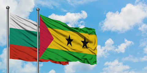 Bulgaria and Sao Tome And Principe flag waving in the wind against white cloudy blue sky together. Diplomacy concept, international relations.