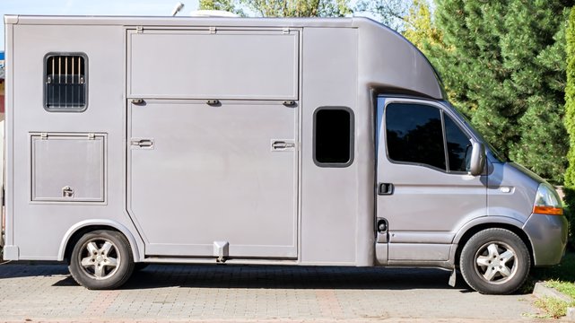 horse vehicle .  Carriage for horses . Auto trailer for transportation of horses . transportation livestock . Horse transportation van . equestrian sport