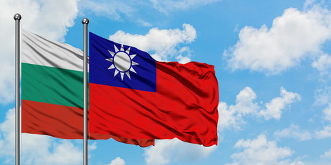 Bulgaria and Taiwan flag waving in the wind against white cloudy blue sky together. Diplomacy concept, international relations.