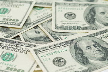 Background of one hundred dollar bills. Benjamin Franklin on USA money banknote