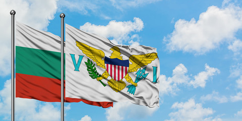 Bulgaria and United States Virgin Islands flag waving in the wind against white cloudy blue sky together. Diplomacy concept, international relations.