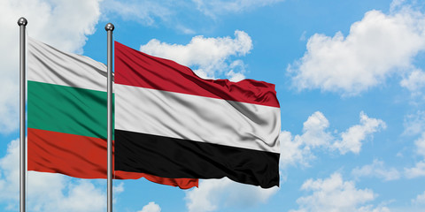 Bulgaria and Yemen flag waving in the wind against white cloudy blue sky together. Diplomacy concept, international relations.