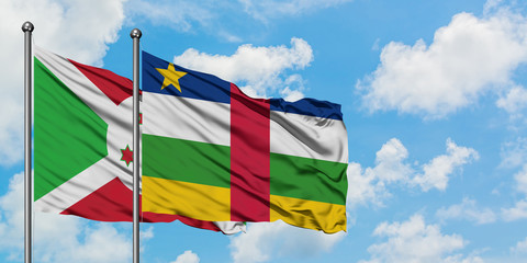 Burundi and Central African Republic flag waving in the wind against white cloudy blue sky together. Diplomacy concept, international relations.
