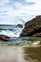 waves crashing on rocks