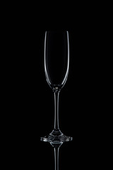 wine glass, glassware, glass.  champagne glass on a black background. Aesthetic beautiful view of the glass