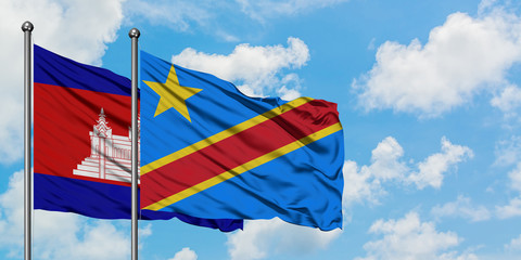 Cambodia and Congo flag waving in the wind against white cloudy blue sky together. Diplomacy concept, international relations.