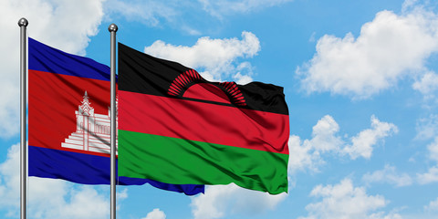 Cambodia and Malawi flag waving in the wind against white cloudy blue sky together. Diplomacy concept, international relations.