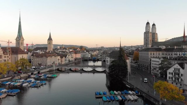 Aerial cityscape video of Zurich and River Limmat, Switzerland, crane up shot