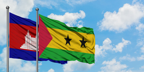 Cambodia and Sao Tome And Principe flag waving in the wind against white cloudy blue sky together. Diplomacy concept, international relations.