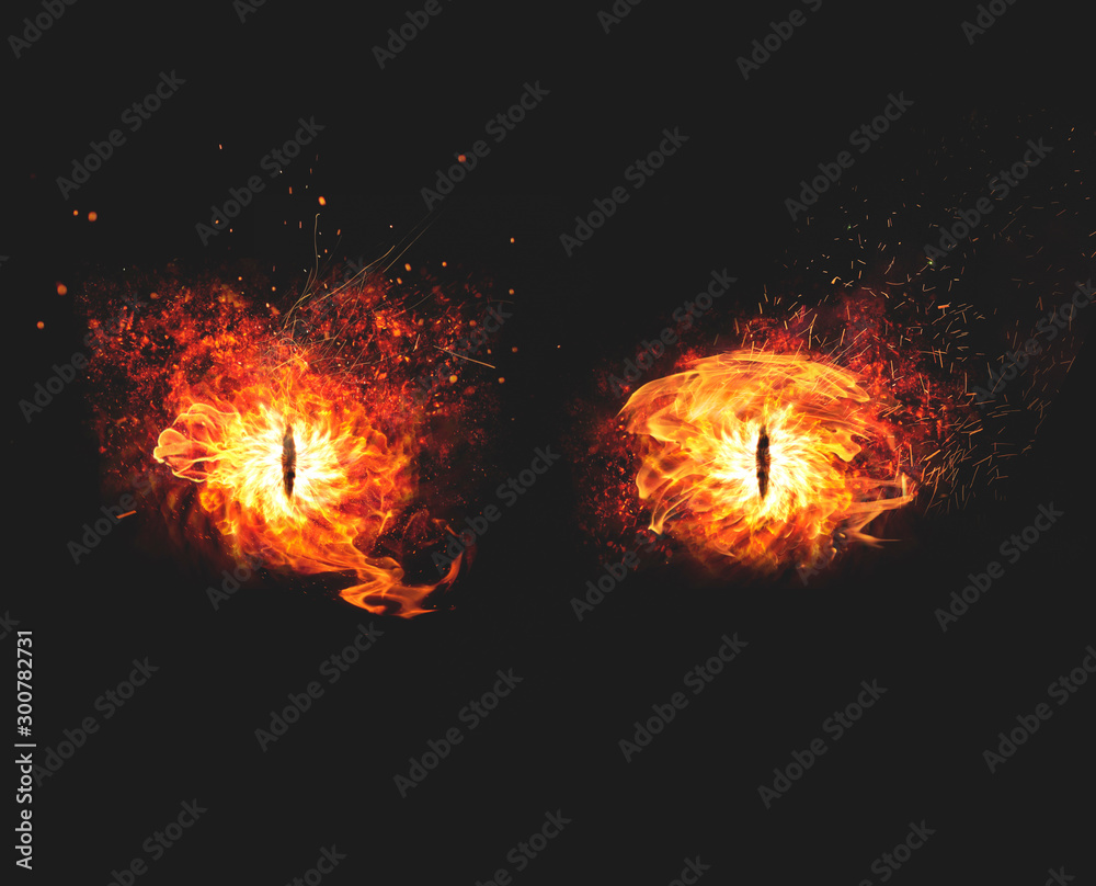 Wall mural blazing flames of fire for a demon eyes artwork on dark background