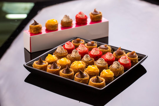 oriental konafa dessert filled with chocolate , mango, chestnut pure and cream cheese