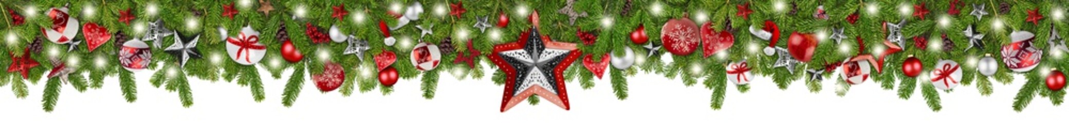 christmas garland super wide panorama banner with fir branches red silver stars lights and baubles...