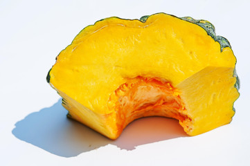 Pumpkin slice on white background