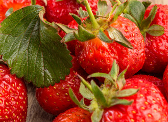 Freshly picked strawberries closeup. Berries Background.