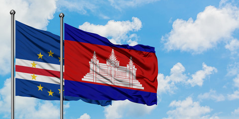 Cape Verde and Cambodia flag waving in the wind against white cloudy blue sky together. Diplomacy concept, international relations.