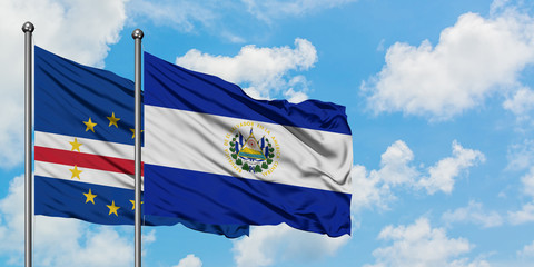 Cape Verde and El Salvador flag waving in the wind against white cloudy blue sky together. Diplomacy concept, international relations.