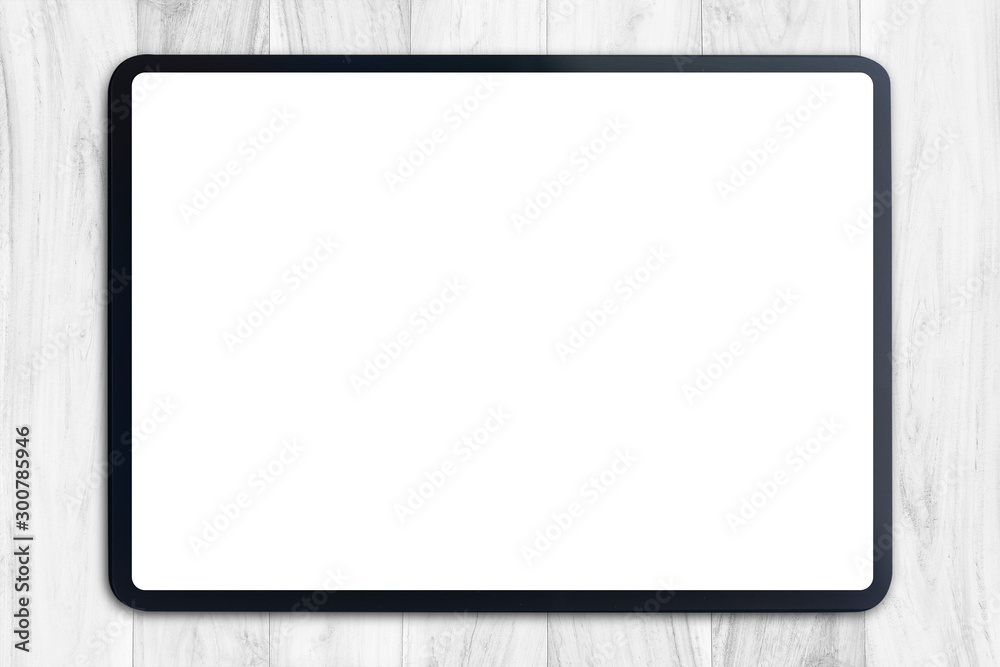Poster Digital tablet mock up on white wood table with Clipping path on tablet blank screen easy replace you design