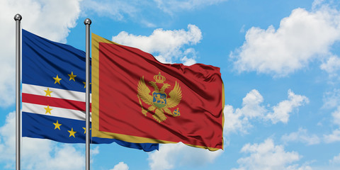 Cape Verde and Montenegro flag waving in the wind against white cloudy blue sky together. Diplomacy concept, international relations.