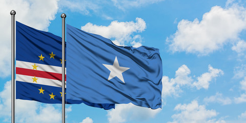 Cape Verde and Somalia flag waving in the wind against white cloudy blue sky together. Diplomacy concept, international relations.