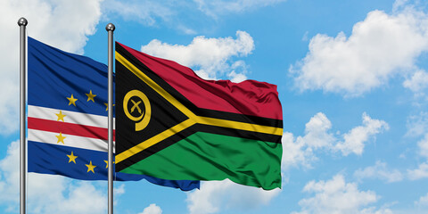 Cape Verde and Vanuatu flag waving in the wind against white cloudy blue sky together. Diplomacy concept, international relations.