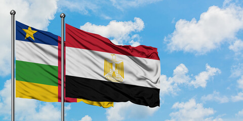 Central African Republic and Egypt flag waving in the wind against white cloudy blue sky together. Diplomacy concept, international relations.