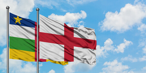 Central African Republic and England flag waving in the wind against white cloudy blue sky together. Diplomacy concept, international relations.