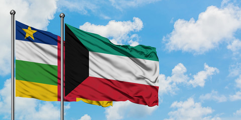 Central African Republic and Kuwait flag waving in the wind against white cloudy blue sky together. Diplomacy concept, international relations.