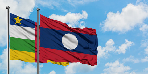 Central African Republic and Laos flag waving in the wind against white cloudy blue sky together. Diplomacy concept, international relations.