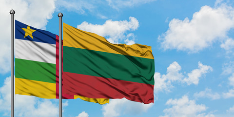 Central African Republic and Lithuania flag waving in the wind against white cloudy blue sky together. Diplomacy concept, international relations.