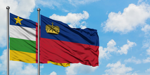 Central African Republic and Liechtenstein flag waving in the wind against white cloudy blue sky together. Diplomacy concept, international relations.