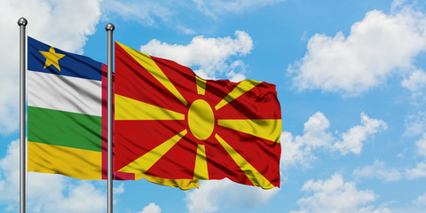 Central African Republic and Macedonia flag waving in the wind against white cloudy blue sky together. Diplomacy concept, international relations.