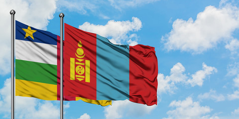 Central African Republic and Mongolia flag waving in the wind against white cloudy blue sky together. Diplomacy concept, international relations.
