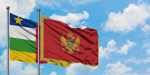Central African Republic and Montenegro flag waving in the wind against white cloudy blue sky together. Diplomacy concept, international relations.