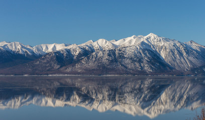 Obraz na płótnie Canvas Beautiful Mountain Ranges on Cook Inlet in Alaska