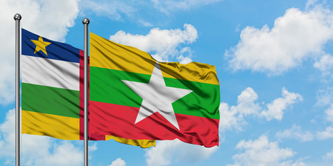 Central African Republic and Myanmar flag waving in the wind against white cloudy blue sky together. Diplomacy concept, international relations.