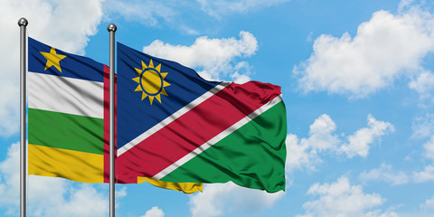 Central African Republic and Namibia flag waving in the wind against white cloudy blue sky together. Diplomacy concept, international relations.