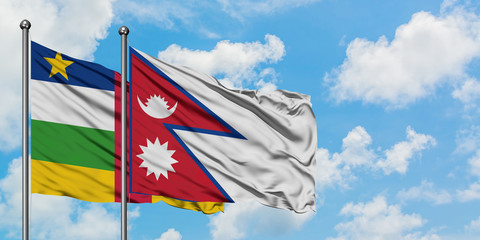 Central African Republic and Nepal flag waving in the wind against white cloudy blue sky together. Diplomacy concept, international relations.