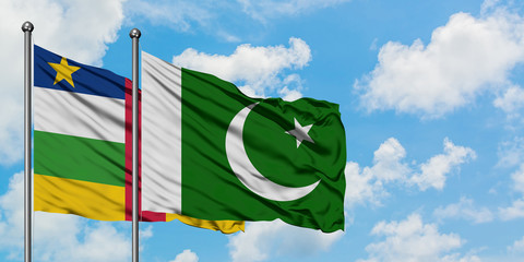 Central African Republic and Pakistan flag waving in the wind against white cloudy blue sky together. Diplomacy concept, international relations.
