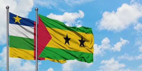 Central African Republic and Sao Tome And Principe flag waving in the wind against white cloudy blue sky together. Diplomacy concept, international relations.