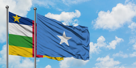 Central African Republic and Somalia flag waving in the wind against white cloudy blue sky together. Diplomacy concept, international relations.